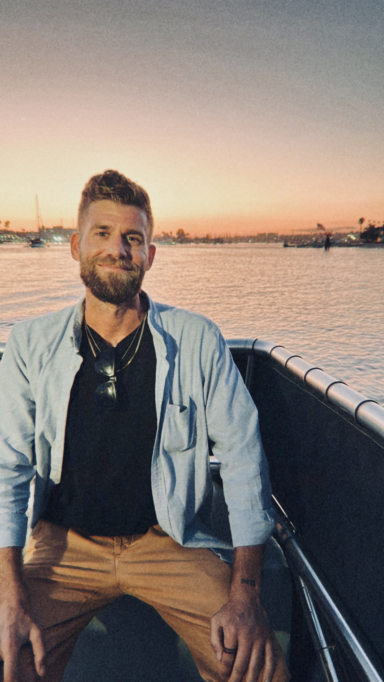 Kota at sunset on a boat